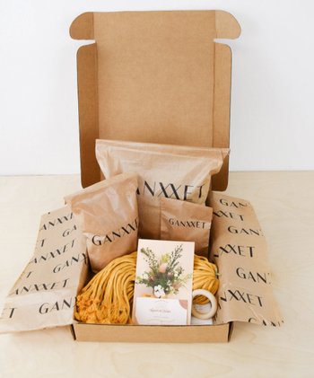 Image of macrame plant hanger kit with yellow cords