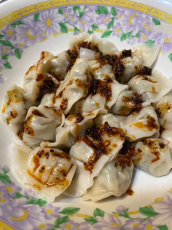 a reviewer's plate of dumplings