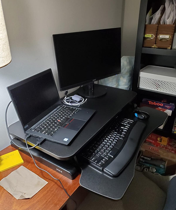 Reviewer's sit-to-stand desk converter with computer setup