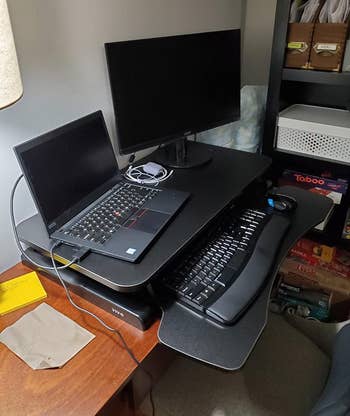Reviewer's sit-to-stand desk converter with computer setup