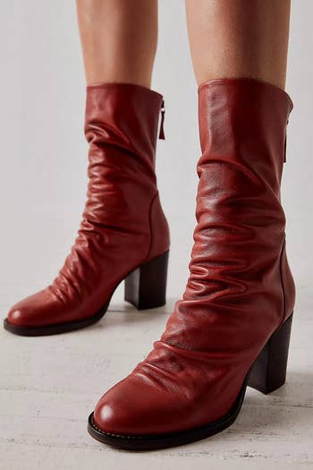 model wearing them in cinder red color