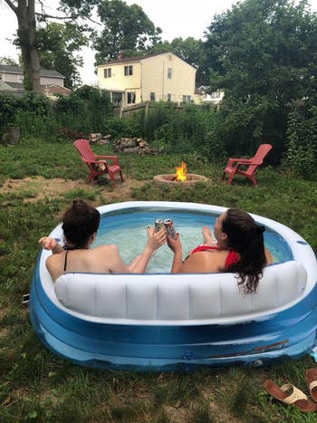 two reviewers sitting in the pool