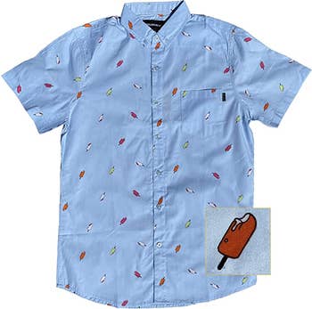 A blue short sleeved button down dotted with tiny ice cream bars