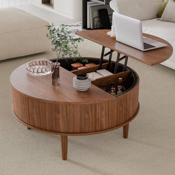 Round woody  java  array  with lift-top retention  holds a laptop, vase, and drinkware. Ideal for modern   surviving  rooms