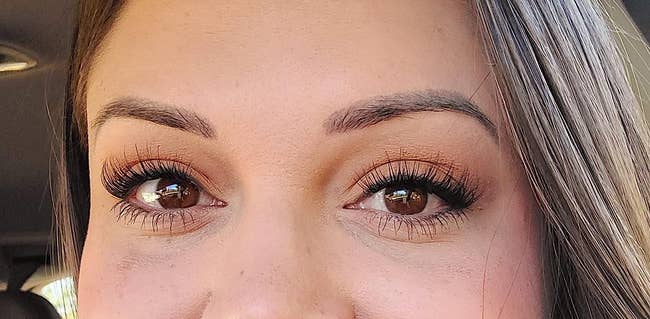 reviewer with falscara lash extensions on