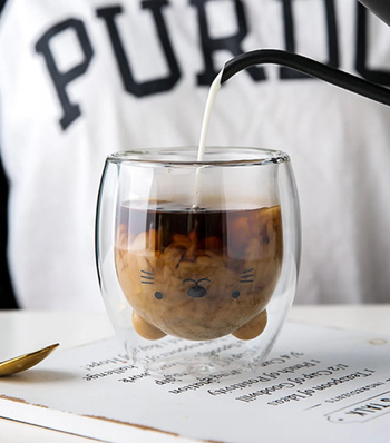 The glass cup that looks like an upside down bear