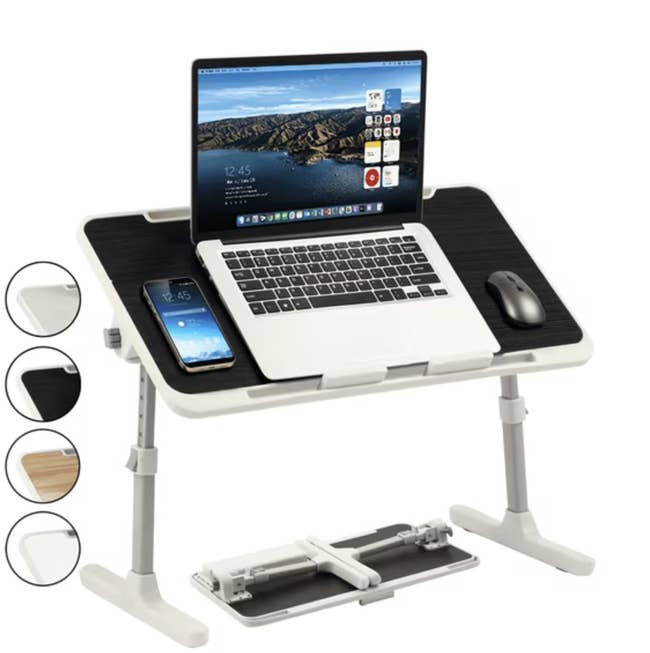 Adjustable laptop table with built-in telephone holder and rodent pad, shown with a laptop and rodent connected it. Different aboveground colors displayed