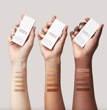 three models with different skin tones showing the shades swatched out 