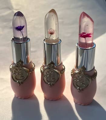 reviewers three lipsticks with flowers in them 