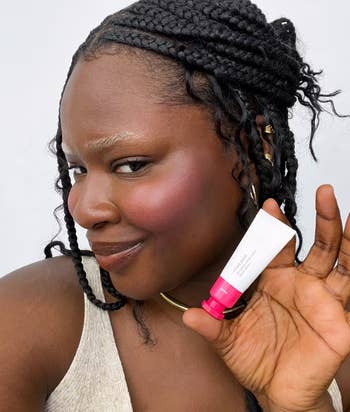 A darker toned model using the soar colored blush 