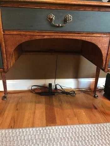 reviewer before photo of tangled mess of cords under a desk