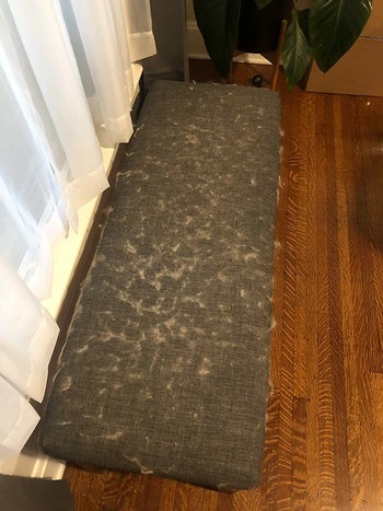 before reviewer image of a bench covered in fur