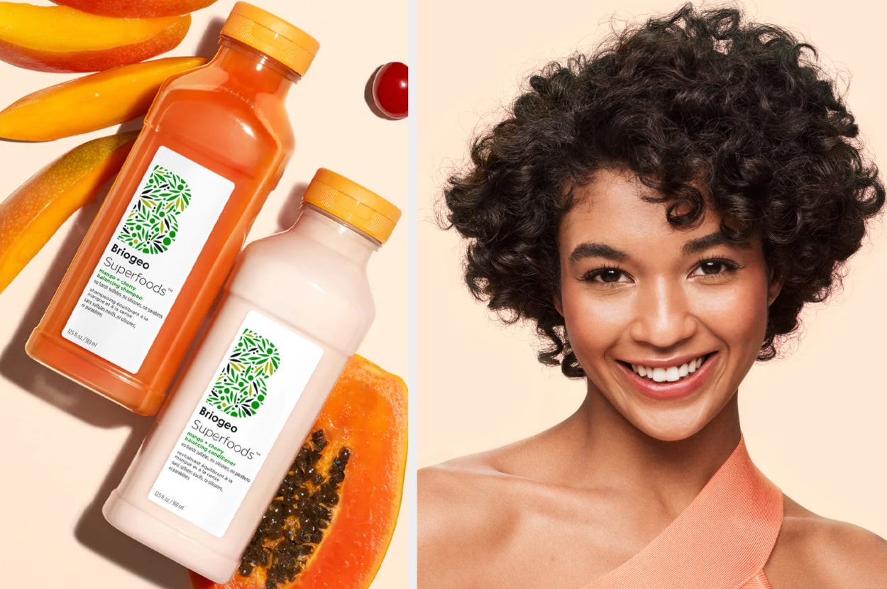 Orange bottle of shampoo and white bottle of conditioner on top of mango, model with shiny curly brown hair and peach top