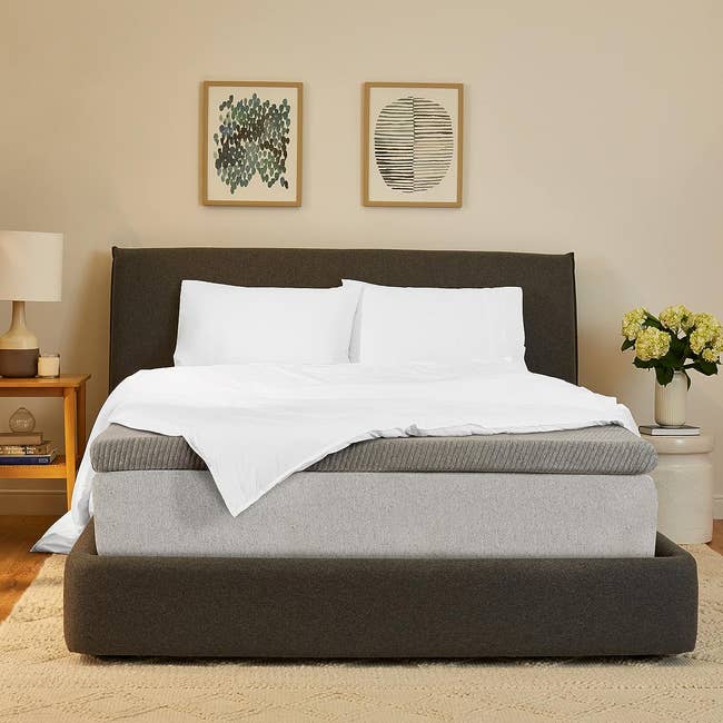 gray queen size topper on bed