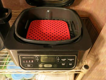 The red square liner in an air fryer