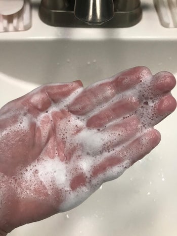 reviewer photo of their sudsy hands
