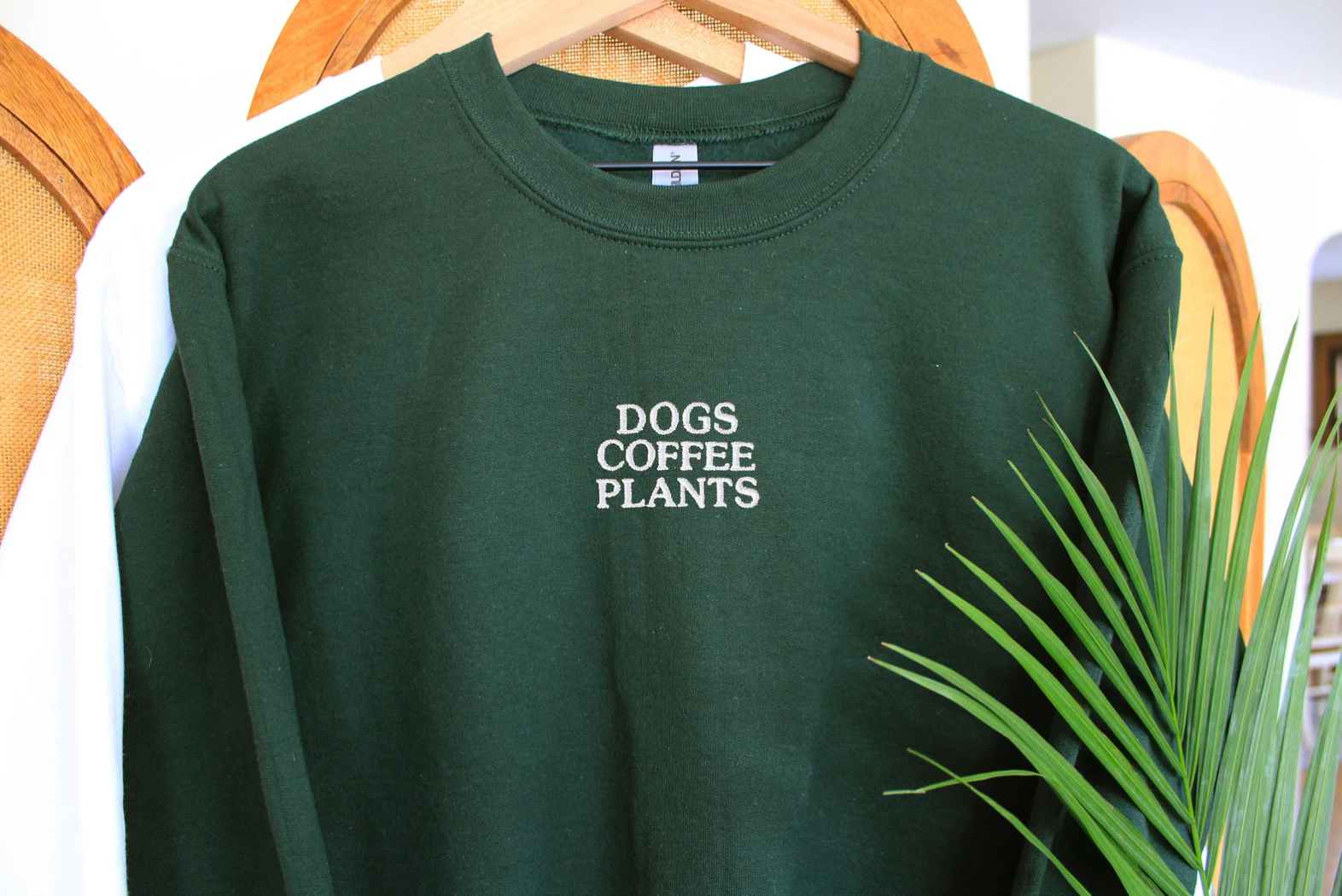 green sweatshirt with the words 