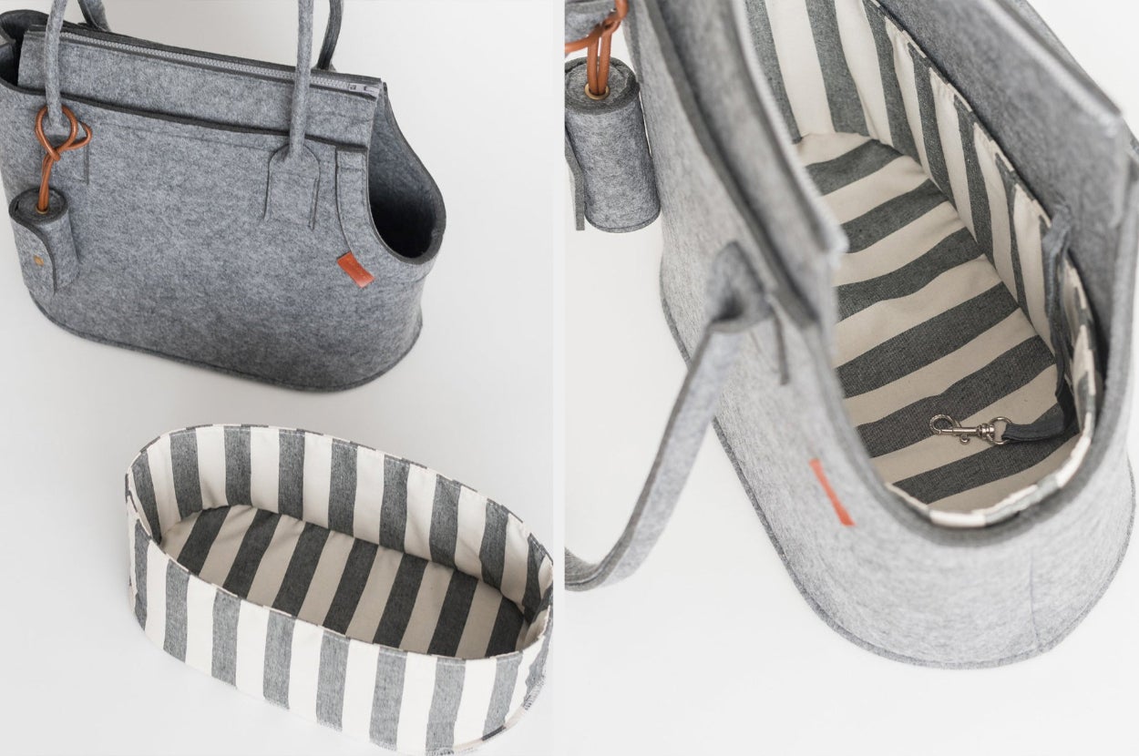 Gray bag with removable insert and poop bag attached, interior view of product