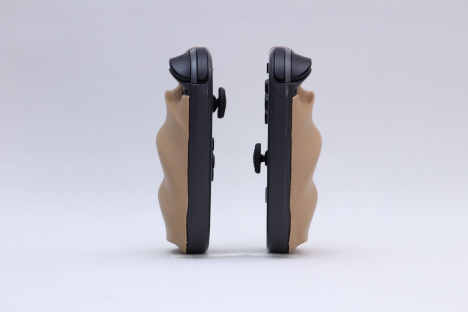 a tan grip for the nintendo joycons