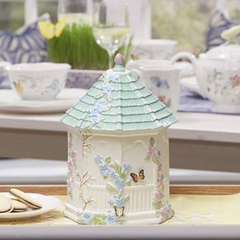 gazebo-shaped cookie jar with flower and butterfly detail