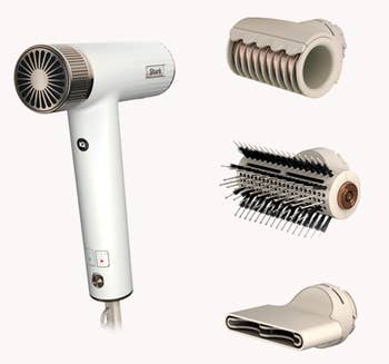 the hair dryer and the three different attachments 