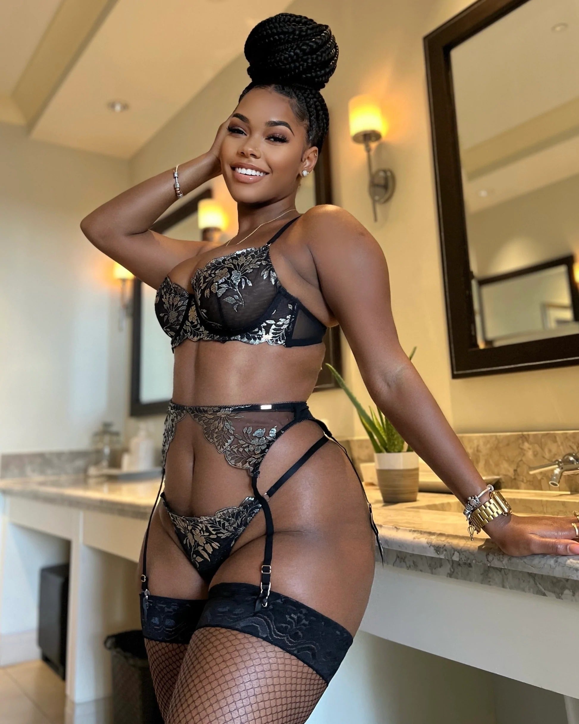 model in three piece garter set