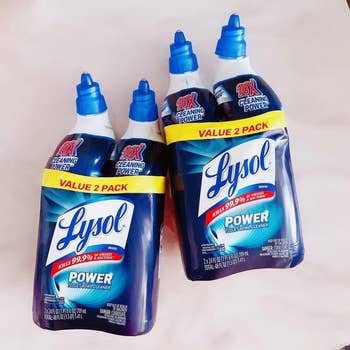 Two value packs of Lysol Power toilet bowl cleaner on a plain surface