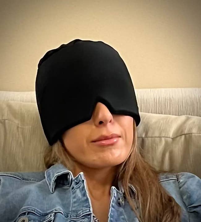 reviewer wearing eye cover