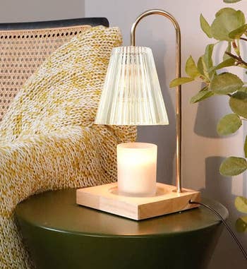 the candle warmer lamp on an end table