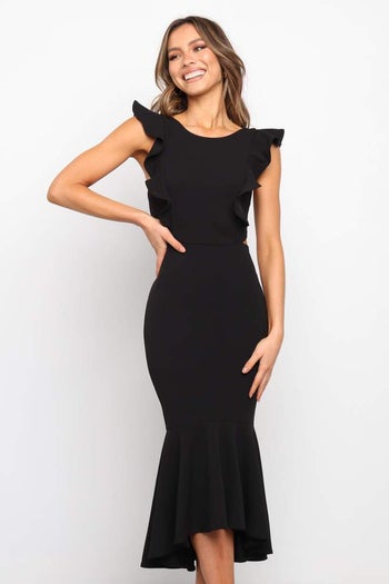 model wearing the black dress
