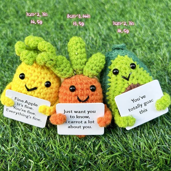 Three plush toy fruits with punny phrases on tags, ideal for a whimsical gift