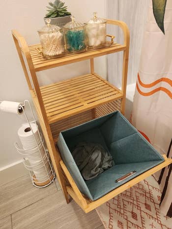 the aforesaid support with the hamper compartment open