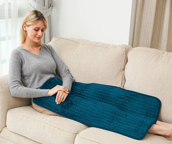 Same model wearing it draped over their legs 