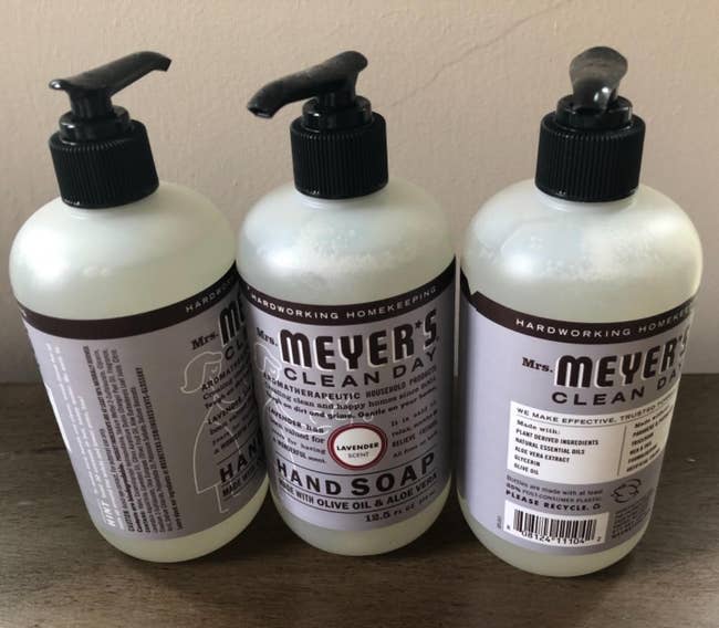 Reviewer image of three hand soaps with purple labels