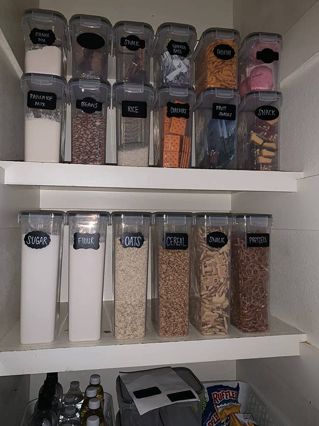A reviewer's pantry with the storage containers filled with cereal, snacks, and dry ingredients 