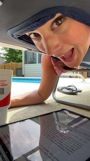 Reviewer photograph  of their look   portion    speechmaking  connected  their kindle and lying connected  their tummy  connected  the lounger
