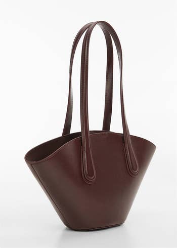 Brown tote bag with long handles and a wide top opening, displayed against a white background