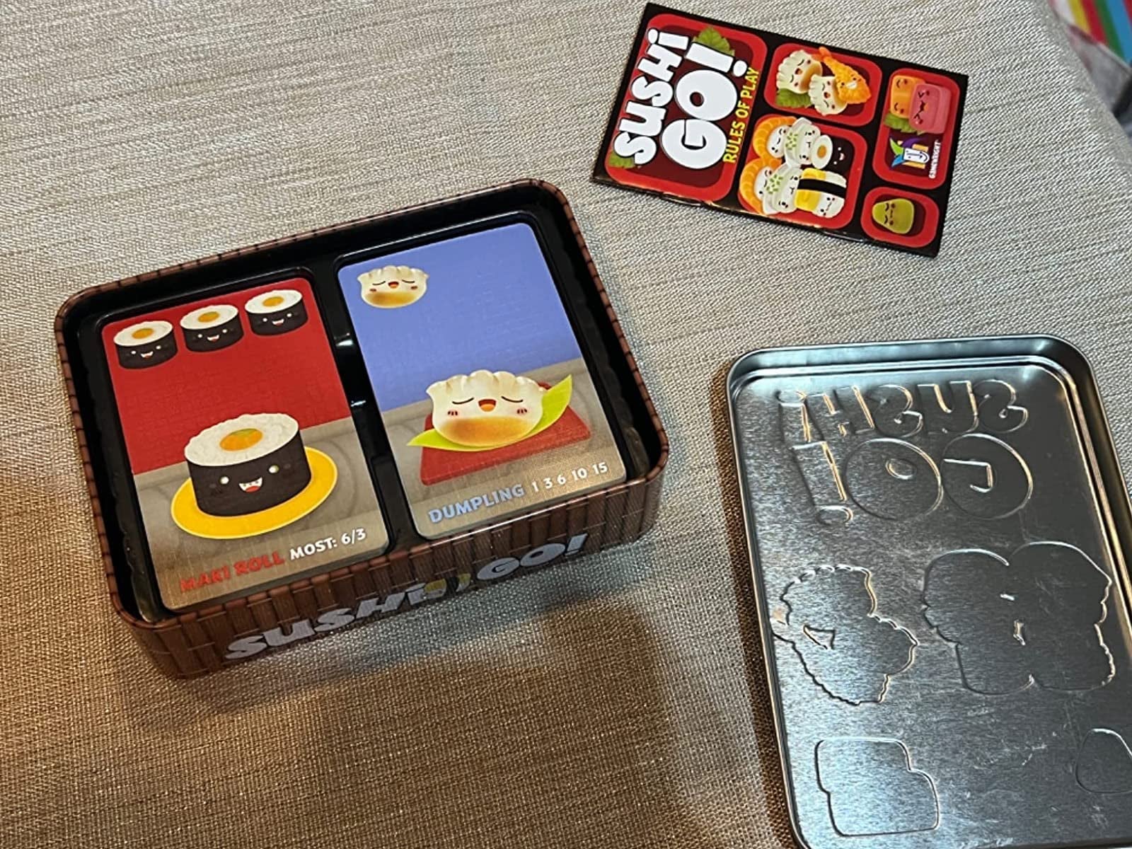 reviewer image of the container of sushi go cards