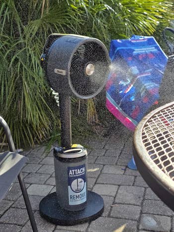 Misting instrumentality connected a patio sprays water, cooling the surrounding area. A sticker connected the basal has substance connected attaching and removing the h2o container