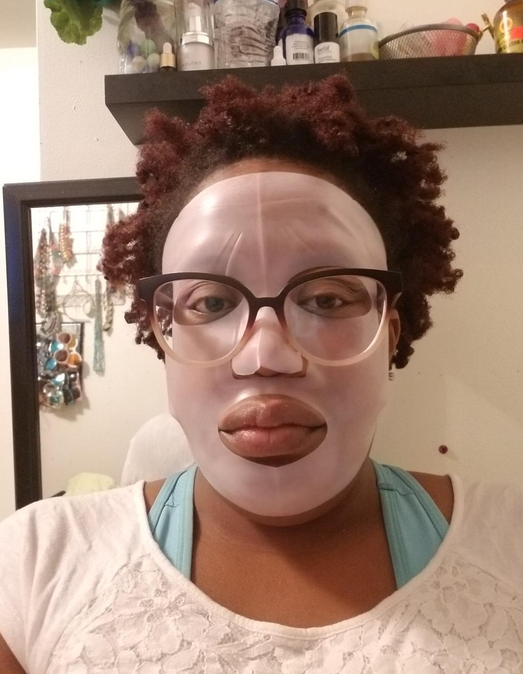 A reviewer wearing the silicone mask cover