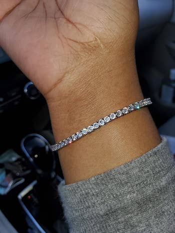 a different reviewer showing off the bracelet