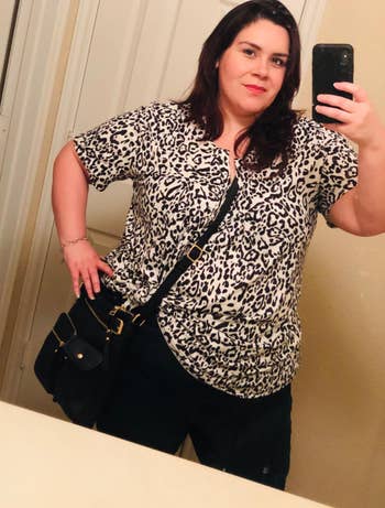 reviewer in leopard print short sleeve tunic top