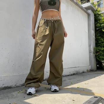 model wearing the pants in olive green