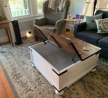 reviewer photo of farmhouse coffee table, lift top open