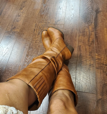 reviewer photo of them wearing brown slouchy boots