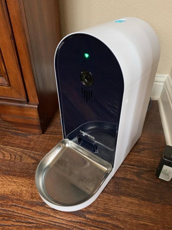 Reviewer image of product in black and white on hardwood floor