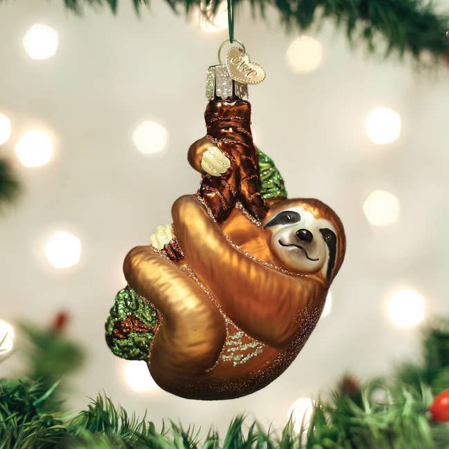 a glass blown sloth ornament