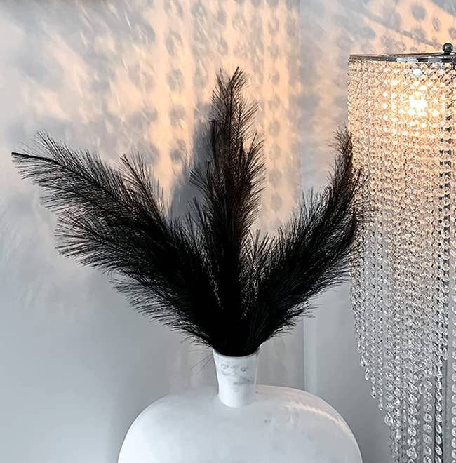 Reviewer image of black faux pampas grass in a vase