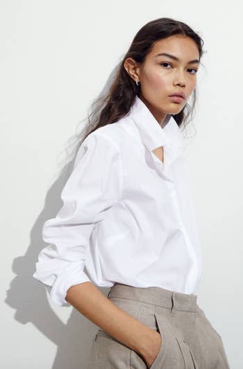 model wearing the button down in white