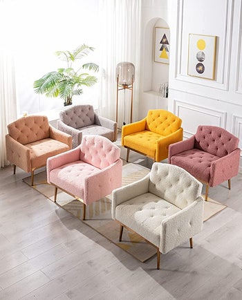 six upholstered and tufted chairs in pink, white, tan, grey, and yellow